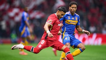 Alexis Vega (L) of Toluca fights for the ball with Jonathan Herrera (R) of Tigres during the 5th round match between Toluca and Tigres UANL as part of the Liga BBVA MX, Torneo Clausura 2025 at Nemesio Diez Stadium, on February 01, 2025 in Toluca, Estadio de Mexico, Mexico.