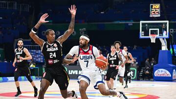 USA's Brandon Ingram (R) dribbles past Jordan's Rondae Hollis Jefferson (L) during the FIBA Basketball World Cup group C match between USA and Jordan at Mall of Asia Arena in Pasay City, metro Manila on August 30, 2023. (Photo by SHERWIN VARDELEON / AFP)