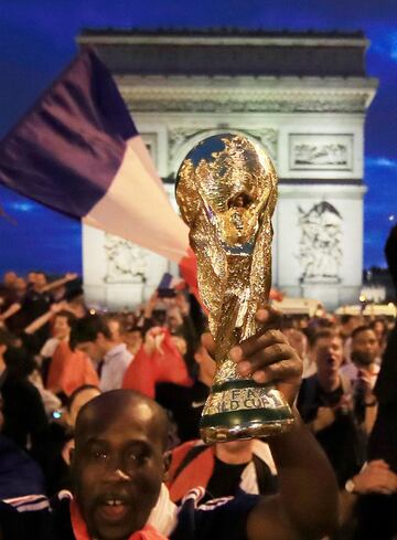 French fans take to the streets to celebrate World Cup final place