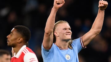 Manchester City's Norwegian striker Erling Haaland celebrates scoring the team's fourth goal during the English Premier League football match between Manchester City and Arsenal at the Etihad Stadium in Manchester, north west England, on April 26, 2023. (Photo by Oli SCARFF / AFP) / RESTRICTED TO EDITORIAL USE. No use with unauthorized audio, video, data, fixture lists, club/league logos or 'live' services. Online in-match use limited to 120 images. An additional 40 images may be used in extra time. No video emulation. Social media in-match use limited to 120 images. An additional 40 images may be used in extra time. No use in betting publications, games or single club/league/player publications. / 