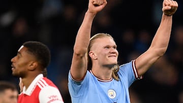 Manchester City's Norwegian striker Erling Haaland celebrates scoring the team's fourth goal during the English Premier League football match between Manchester City and Arsenal at the Etihad Stadium in Manchester, north west England, on April 26, 2023. (Photo by Oli SCARFF / AFP) / RESTRICTED TO EDITORIAL USE. No use with unauthorized audio, video, data, fixture lists, club/league logos or 'live' services. Online in-match use limited to 120 images. An additional 40 images may be used in extra time. No video emulation. Social media in-match use limited to 120 images. An additional 40 images may be used in extra time. No use in betting publications, games or single club/league/player publications. / 