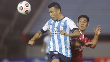 Montevideo (Uruguay), 21/04/2021.- Ederson Salomon Rodriguez (R) of Rentistas in action against Nery Andres Dominguez of Racing during a Copa Libertadores group E soccer match at the Centenario stadium in Montevideo, Uruguay, 21 April 2021. EFE/EPA/Matild