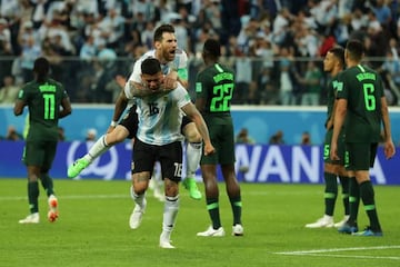 Get in! Marcos Rojo and Messi celebrate