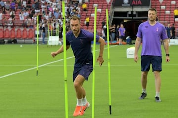 Tottenham Hotspur's Christian Eriksen (L) takes part in an official football training session ahead of the International Champions Cup in Singapore on July 19, 2019.