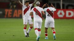 Soccer Football - World Cup - South American Qualifiers - Peru v Paraguay - Estadio Nacional, Lima, Peru - March 29, 2022  Peru's Gianluca Lapadula celebrates scoring their first goal with teammates REUTERS/Sebastian Castaneda