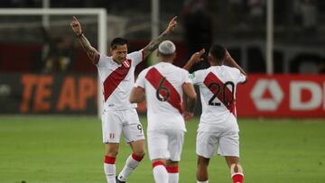 Soccer Football - World Cup - South American Qualifiers - Peru v Paraguay - Estadio Nacional, Lima, Peru - March 29, 2022  Peru's Gianluca Lapadula celebrates scoring their first goal with teammates REUTERS/Sebastian Castaneda