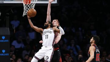 Jan 31, 2020; Brooklyn, New York, USA;  Brooklyn Nets guard Kyrie Irving (11) moves to the basket against Chicago Bulls forward Luke Kornet (2) during the first half at Barclays Center. Mandatory Credit: Noah K. Murray-USA TODAY Sports