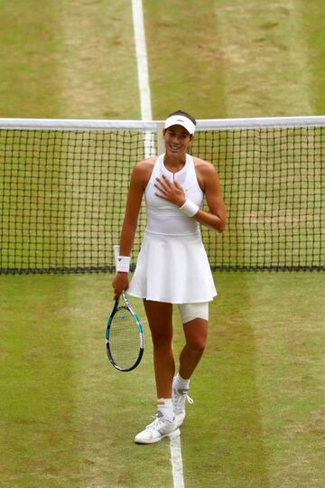 Garbine Muguruza of Spain celebrates match point and victory during the Ladies Singles semi final match against Magdalena Rybarikova of Slovakia