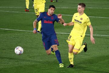 Juan Foyth y Luis Suárez.