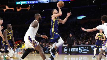 Stephen Curry #30 of the Golden State Warriors shoots past the defense of LeBron James #23 of the Los Angeles Lakers during the second half of a game at Crypto.com Arena on March 16, 2024 in Los Angeles, California.