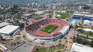 Aerial view of the National Stadium (C), the heart of the new National Stadium Sports Park, in Santiago taken on October 4, 2023, while its being conditioned for the upcoming Pan American Games Santiago 2023. The new National Stadium Sports Park was built around the existing National Stadium and includes 11 other new or renovated venues that will host sports such as athletics, field hockey, skating, swimming and tennis. The Pan-American Games will run from October 20 to November 5. (Photo by Martin BERNETTI / AFP)