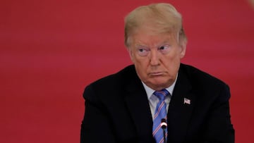 FILE PHOTO: U.S. President Donald Trump listens during a meeting of the American Workforce Policy Advisory Board in the East Room at the White House in Washington, U.S., June 26, 2020. REUTERS/Carlos Barria/File Photo