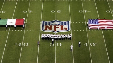 MEXICO CITY, D.F. - OCTOBER 02:  The American and Mexican flags are displayed on the field during the pre-game ceremony before the game between the Arizona Cardinals and the San Francisco 49ers at Estadio Azteka on October 2, 2005 in Mexico City, Mexico.  (Photo by Robert Laberge/Getty Images)