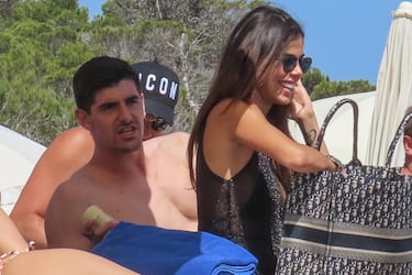 The Real Madrid and Belgium goalkeeper is recharging his batteries on the beaches of the Spanish island Ibiza.