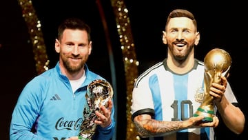 FILE PHOTO: Soccer Football - Copa Libertadores - Draw - Conmebol headquarters, Luque, Paraguay - March 27, 2023 Argentina's Lionel Messi poses with a statue of himself holding the World Cup during the Conmebol event. REUTERS/Cesar Olmedo/File Photo