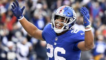 EAST RUTHERFORD, NEW JERSEY - DECEMBER 30: Saquon Barkley #26 of the New York Giants reacts after scoring during the fourth quarter of the game against the Dallas Cowboys at MetLife Stadium on December 30, 2018 in East Rutherford, New Jersey.   Sarah Stier/Getty Images/AFP
 == FOR NEWSPAPERS, INTERNET, TELCOS &amp; TELEVISION USE ONLY ==