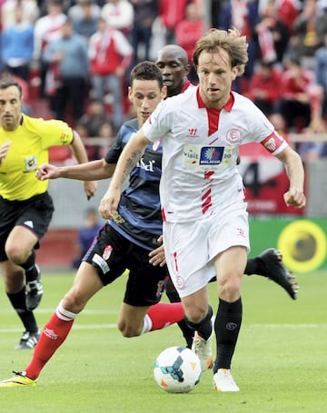 En enero de 2011, Rakitic ficha por el Sevilla, donde jugará hasta 2014. En este periodo llega a convertirse capitán del equipo y consigue la Europa League en 2014