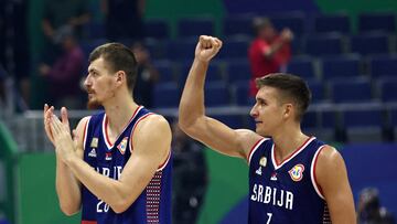 FILE PHOTO: Basketball - FIBA World Cup 2023 - First Round - Group B - Puerto Rico v Serbia - Araneta Coliseum, Quezon, Philippines - August 28, 2023 Serbia's Borisa Simanic celebrates with Serbia's Bogdan Bogdanovic after winning the match REUTERS/Eloisa Lopez/File Photo