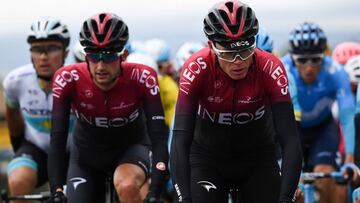 Team Ineos rider Great Britain's Christopher Froome (R) rides during the second stage of the 71st edition of the Criterium du Dauphine cycling race, 180 km between Mauriac and Craponne-sur-Arzon on June 10, 2019. (Photo by Anne-Christine POUJOULAT / AFP)