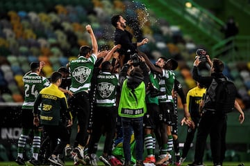 (FILES) Players toss Sporting's head coach Ruben Amorim