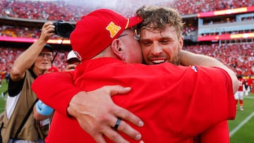 KANSAS CITY, MISSOURI - SEPTEMBER 15: Head coach Andy Reid of the Kansas City Chiefs hugs Harrison Butker #7 after defeating the Cincinnati Bengals at GEHA Field at Arrowhead Stadium on September 15, 2024 in Kansas City, Missouri. David Eulitt/Getty Images/AFP (Photo by David Eulitt / GETTY IMAGES NORTH AMERICA / Getty Images via AFP)