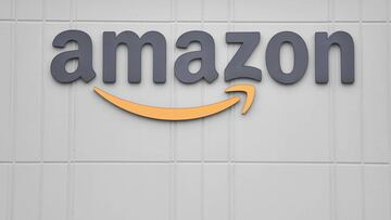 (FILES) In this file photo taken on March 30, 2020 the logo of US online retail giant Amazon is seen at the distribution center in Staten Island as workers strike in demand that the facility be shut down and cleaned after one staffer tested positive for t