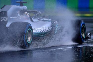 Hamilton leads Mercedes one-two at sodden Hungaroring
