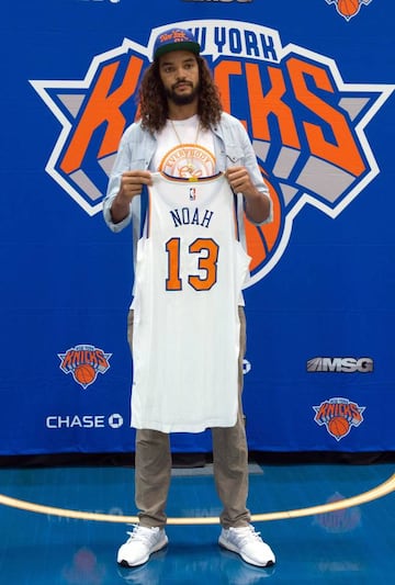 The New York Knicks' newest player Joakim Noah posing for photographs at Madison Square Garden training center in Tarrytown, New York.