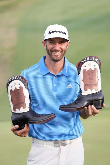 Dustin Johnson poses with boots after winning the World Golf Championships-Dell Technologies Match Play at the Austin Country Club on March 26, 2017.