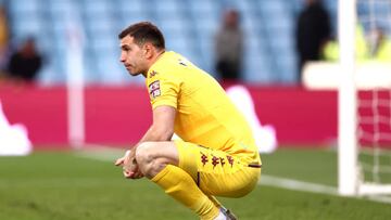 BIRMINGHAM, ENGLAND - APRIL 09: Emiliano Martinez of Aston Villa looks dejected following their side's defeat in the Premier League match between Aston Villa and Tottenham Hotspur at Villa Park on April 09, 2022 in Birmingham, England. (Photo by Naomi Baker/Getty Images)