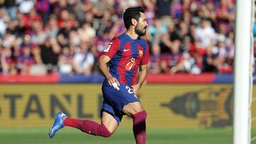 Barcelona's German midfielder #22 Ilkay Gundogan celebrates scoring the opening goal during the Spanish league football match between FC Barcelona and Real Madrid CF at the Estadi Olimpic Lluis Companys in Barcelona on October 28, 2023. (Photo by LLUIS GENE / AFP)