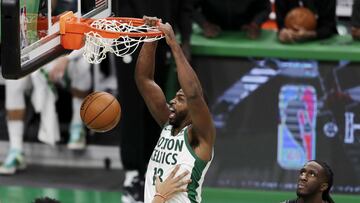 BOSTON, MASSACHUSETTS - DECEMBER 25: Tristan Thompson #13 of the Boston Celtics dunks over Jarrett Allen #31 of the Brooklyn Nets during the first quarter of the game at TD Garden on December 25, 2020 in Boston, Massachusetts. NOTE TO USER: User expressly acknowledges and agrees that, by downloading and or using this photograph, User is consenting to the terms and conditions of the Getty Images License Agreement.   Omar Rawlings/Getty Images/AFP
 == FOR NEWSPAPERS, INTERNET, TELCOS &amp; TELEVISION USE ONLY ==