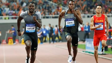 Justin Gatlin (izquierda) ha vencido en los 100 metros de la Diamond League de Shanghai.