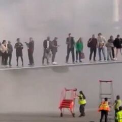 New footage revealed: passengers escape onto wing as American Airlines plane burns in Denver