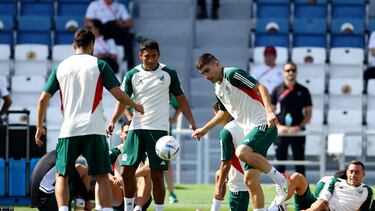 Soccer Football - FIFA World Cup Qatar 2022 - Mexico Training - Al Khor SC Stadium, Al Khor, Qatar - November 29, 2022 Mexico's Luis Romo and Johan Vasquez during training REUTERS/Siphiwe Sibeko