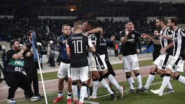 PAOK&#039;s players celebrate after scoring against AEK Athens, during the Greek Cup final soccer match at the empty of fans Olympic stadium in Athens, Saturday, May 11, 2019. (AP Photo/Yorgos Karahalis)