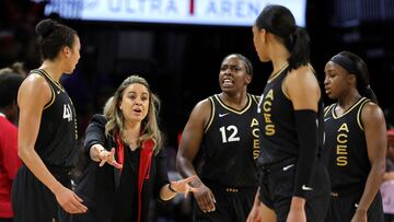 LAS VEGAS, NEVADA - AUGUST 20: (L-R) Kiah Stokes #41, head coach Becky Hammon, Chelsea Gray #12, A'ja Wilson #22 and Jackie Young #0 of the Las Vegas Aces talk on the court in the second quarter of Game Two of the 2022 WNBA Playoffs first round against the Phoenix Mercury at Michelob ULTRA Arena on August 20, 2022 in Las Vegas, Nevada. The Aces defeated the Mercury 117-80 to win the series. NOTE TO USER: User expressly acknowledges and agrees that, by downloading and or using this photograph, User is consenting to the terms and conditions of the Getty Images License Agreement.   Ethan Miller/Getty Images/AFP
== FOR NEWSPAPERS, INTERNET, TELCOS & TELEVISION USE ONLY ==