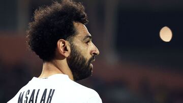 Egypt&#039;s forward Mohamed Salah reacts during the Group D Africa Cup of Nations (CAN) 2021 football match between Guinea-Bissau and Egypt at Stade Roumde Adjia in Garoua on January 15, 2022. (Photo by Daniel BELOUMOU OLOMO / AFP)