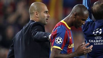 Pep Guardiola y Eric Abidal.