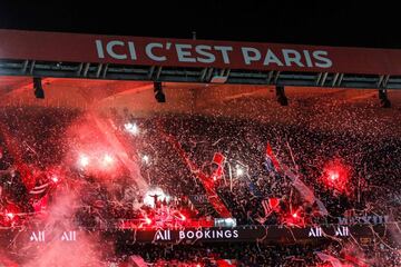 Paris Saint Germain's supporters cheer during the French L1 football match between Paris Saint-Germain (PSG) and Lyon (OL) at the Parc des Princes stadium in Paris, on February 9, 2020. (Photo by GEOFFROY VAN DER HASSELT / AFP)