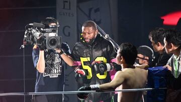 US boxer Floyd Mayweather (C) arrives for his exhibition match against Japanese mixed martial artist Mikuru Asakura at the Saitama Super Arena in Saitama on September 25, 2022. (Photo by Philip FONG / AFP) (Photo by PHILIP FONG/AFP via Getty Images)