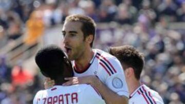 Flamini y Zapata celebran un gol en el Milán.