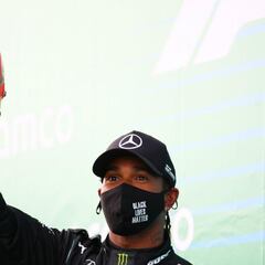 Lewis Hamilton presented with Schumacher's helmet after equalling 91 wins record