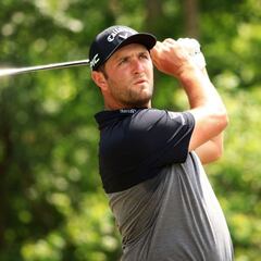 Oosthuizen y Schwartzel lideran con Rahm y Palmer al acecho