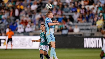 Aug 5, 2024; Commerce City, Colorado, USA; Colorado Rapids midfielder Oliver Larraz (18) heads the ball as Leon midfielder Salvador Reyes Chavez (26) defends in the first half at Dick's Sporting Goods Park. Mandatory Credit: Isaiah J. Downing-USA TODAY Sports