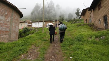 MAYORARCA, PERU - APRIL 11: People walk towards a polling station on April 11, 2021 in Mayorarca, Peru. Of a record number of 18 candidates, half a dozen could reach the likely second round run-off according to late surveys. The election takes place amid an economic and social crisis pushed by coronavirus pandemic and a political turmoil that has been hitting the Andean country in the last years. (Photo by Ricardo Moreira/Getty Images)