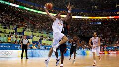 BEIJING - AUGUST 24:  Rudy Fernandez #5 of Spain goes to the basket past Dwight Howard #11 of the United States in the gold medal game during Day 16 of the Beijing 2008 Olympic Games at the Beijing Olympic Basketball Gymnasium on August 24, 2008 in Beijing, China.  (Photo by Harry How/Getty Images)