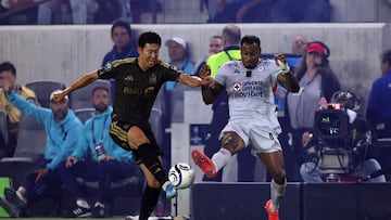 LOS ANGELES, CALIFORNIA - APRIL 7: Son Heung-Min #7 of Los Angeles Football Club battles for the ball with Willer Ditta #4 of Cruz Azul during the second half of the CONCACAF Champions Cup 2026 Quarter-Final First Leg match at Banc of California Stadium on April 7, 2026 in Los Angeles, California. Kevork Djansezian/Getty Images/AFP (Photo by KEVORK DJANSEZIAN / GETTY IMAGES NORTH AMERICA / Getty Images via AFP)