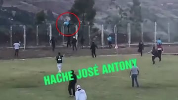 Football referee in Peru scales fence to escape angry fans