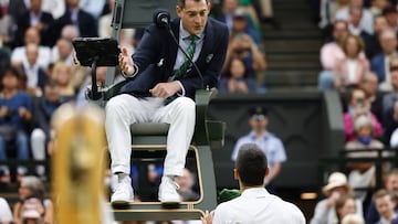 Novak Djokovic argues with the umpire during his Men's Singles semi-final match against Jannik Sinnner.